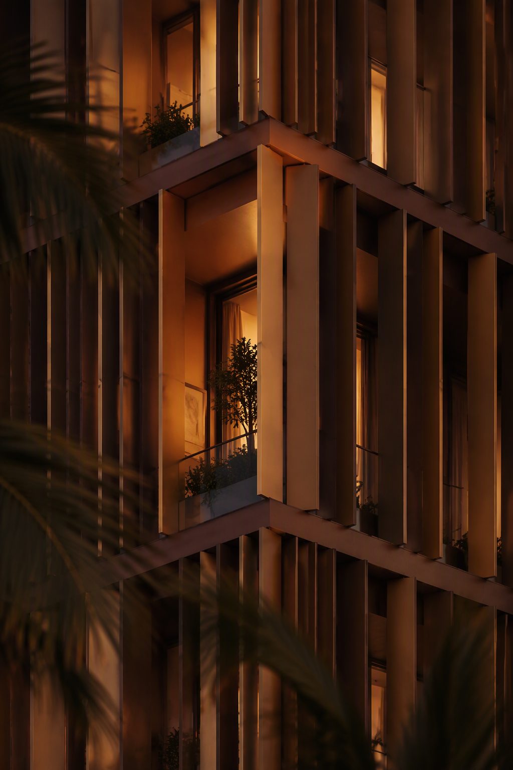 Facade detail at dusk, warm light in the windows